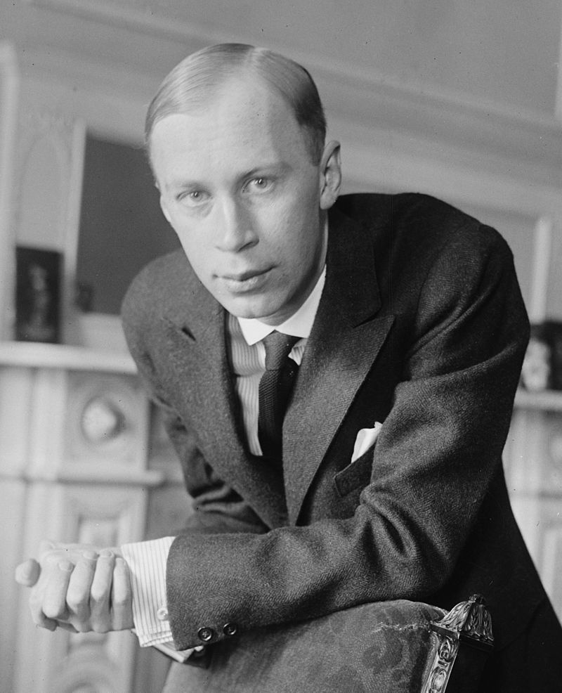 Sergei_Prokofiev_circa_1918_over_Chair_Bain